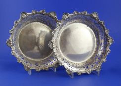A pair of late 19th century Austro-Hungarian pierced and embossed 800 standard silver circular