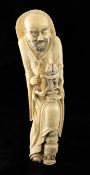 A large Chinese ivory figure of a luohan, 18th / 19th century, the figure in standing pose one