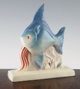 A Susie Cooper `Angelfish`, c.1936, modelled as a blue fish swimming amidst sea-weed on a beige