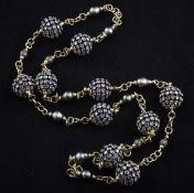 A gold, moonstone and tahitian? pearl necklace, with eight pearls and ten moonstone set globe