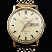 A gentleman`s 1960`s 18ct gold Omega Constellation automatic wrist watch, with baton numerals and