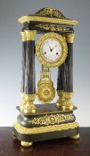 A 19th century French bronze and ormolu portico clock, with silvered Roman dial and bi-metallic