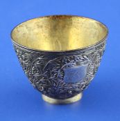 A late 19th/early 20th century Chinese silver cup or bowl, by Luen Wo? embossed with continuous