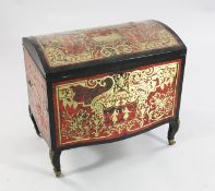A Victorian boulle work dome top trunk, with tortoiseshell and brass inlay, the hinged lid revealing