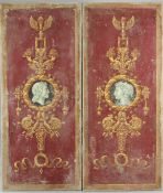 A pair of decorative rectangular red and gilt painted wall panels, decorated in the Empire style