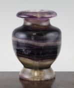 A Victorian Blue John vase, with ovoid body and circular foot, 5.25in.