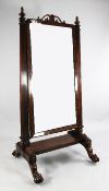 A William IV mahogany cheval mirror, with turned vase shaped finials, tapering square section