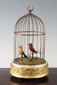 A 20th century Rouge musical singing bird automaton, depicting two birds in a cage, marks to base,