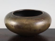 A Chinese bronze compressed globular censer, 17th / 18th century, the base with cast single