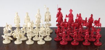 A Chinese ivory chess set, complete with thirty two pieces, the white King and Queen modelled as