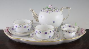 A Herend `Angouleme Sprig` cabaret set for two, 20th century, comprising a teapot, a leaf shaped