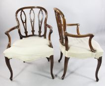 A pair of George III mahogany open armchairs, the cartouche shaped backs with pierced splats,