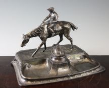 A J P Kayser plated pewter Jugendstil equestrian desk stand, modelled with a jockey on horseback,