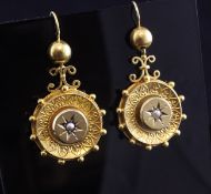 A pair of Victorian gold and seed pearl set drop earrings, of disc form, with scroll decoration