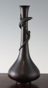 A Japanese bronze `lizard` bottle vase, Meiji period, the slender neck finely modelled with an