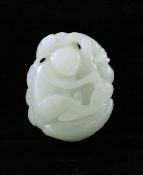 A Chinese pale celadon jade carving of a monkey and lingzhi fungus, 18th century, the monkey to