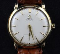 A gentleman`s early 1950`s gold plated Omega automatic wrist watch, with baton numerals and