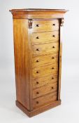 A Victorian mahogany Wellington chest, fitted eight drawers with bun handles and locking side, on
