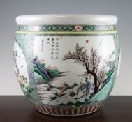 A Chinese famille verte jardiniere, painted with butterflies and birds amid flowers and landscape