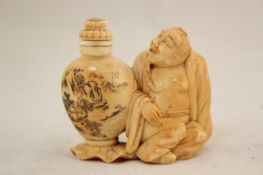 A Chinese ivory figural snuff bottle and stopper, early 20th century, modelled as the figure of Li