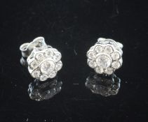 An 18ct white gold and diamond cluster ear studs, with an estimated total diamond weight of 0.90ct.