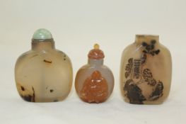 Three Chinese chalcedony snuff bottles, two in Suzhou style, the first with two Peking ducks amid