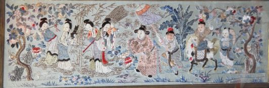 A Chinese applique embroidered silk panel, early 20th century, decorated with a dignitary and