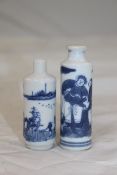 Two Chinese blue and white cylindrical snuff bottles, 1830-1900, the tallest painted with huntsmen