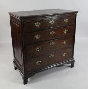 An 18th century oak chest, of four long graduated drawers, on bracket feet, W.3ft .5in.