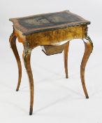 A Victorian Louis XV style serpentine walnut and ormolu mounted work table, with inset leather top,