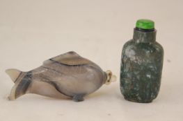 Two Chinese agate snuff bottles, 20th century, the first in banded agate carved as a fish, 8.5cm.,