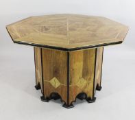 A decorative octagonal top centre table, in the Art Deco style, inlaid with geometric marble