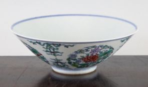 A Chinese doucai conical bowl, Yongzheng mark, possibly Republic period, painted with flower and