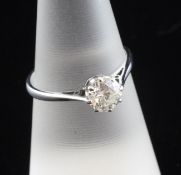 An 18ct white gold and platinum solitaire diamond ring, the round cut stone weighing approximately