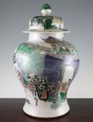 A large Chinese famille verte baluster jar and cover, Guangxu period, painted with figures at a