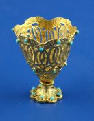 A gilded base metal, turquoise and diamond set zarf, with pierced decoration and set with