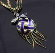 A Victorian 9ct gold, seed pearl and blue enamel mourning pendant, with tassel drops and bow shaped