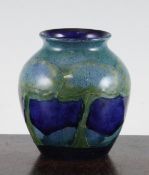 A Moorcroft Moonlit Blue pattern small ovoid vase, c.1920, inscribed WM and impressed mark `