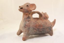 A Pre-Columbian Colima pottery dog vessel, West Mexico, c. 200BC-200AD, decorated in red and black