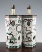 A pair of Chinese enamelled porcelain hexagonal lamp stands, Qianlong marks, late 19th century,