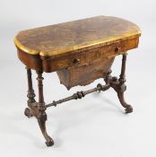 A Victorian burr walnut and marquetry inlaid combination games / work table, the swivel top opening
