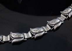 A Georg Jensen Inc USA LP sterling silver leaf and berry bracelet, design no. 145, 7in.