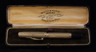 A Watermans Ideal Junior 9ct gold mounted fountain pen, in original leather case