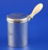 A George IV silver travelling shaving canister, with engraved armorials, hinged lid and detachable