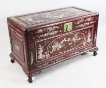 A 20th century Chinese rosewood and mother of pearl inlaid trunk, with camphorwood interior on
