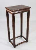 A Chinese hardwood stand, 18th / 19th century, with scroll carved frieze and arched stretchers, H.