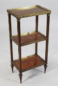 A 19th century French brass mounted three tier whatnot, each tier with perspective cube parquetry
