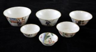 A rare Chinese set of seven famille rose nesting cups, Daoguang period, each painted with figures