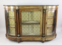 A Victorian walnut and marquetry inlaid ormolu mounted credenza, with central glazed door between a