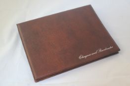 An album of 49 English and Scottish bank notes, including 10/- and £1 (two Bradbury), £20 (Bank of